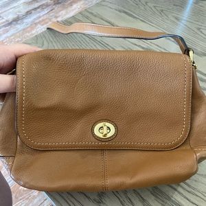Medium size brown coach crossbody